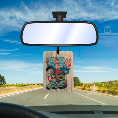 Car Air freshener with image of a cute donkey sitting with the words Kiss my..